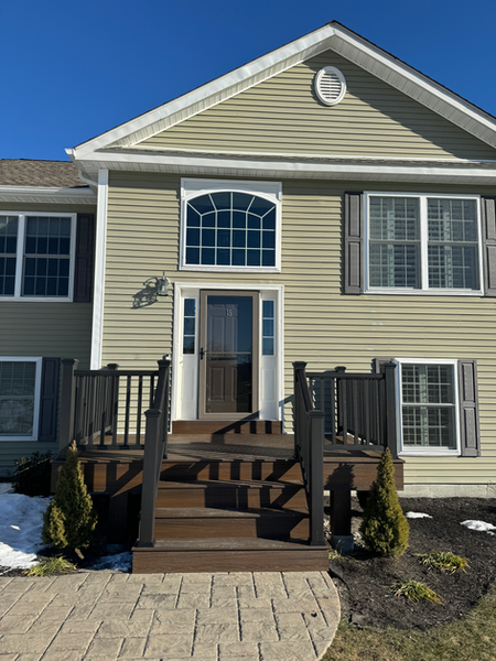 Front of a house with deck construction services by Ryan Davis Contracting