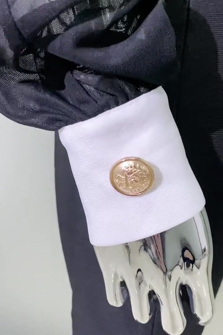 The Selena Gomez Sheer Button Down Dress, a patchwork design worn on the Jimmy Kimmel Show. Available at Cusuti.