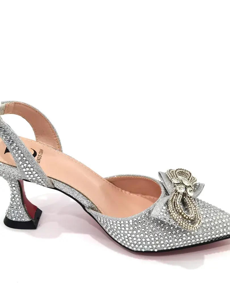 Sequined pointed-toe slingback pumps with high heels and elastic band closure. Butterfly detail on the shoe upper.