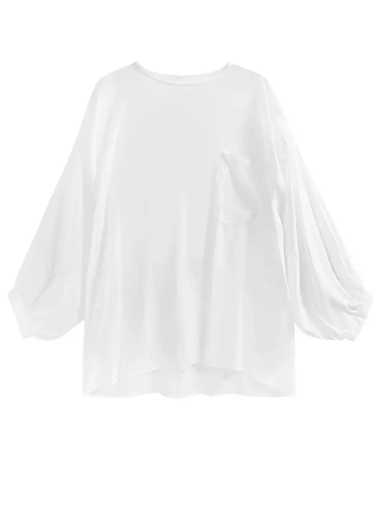 Black and white long sleeve t-shirt with o-neck collar. Relaxed fit. Made from a cotton blend with slight stretch for comfort