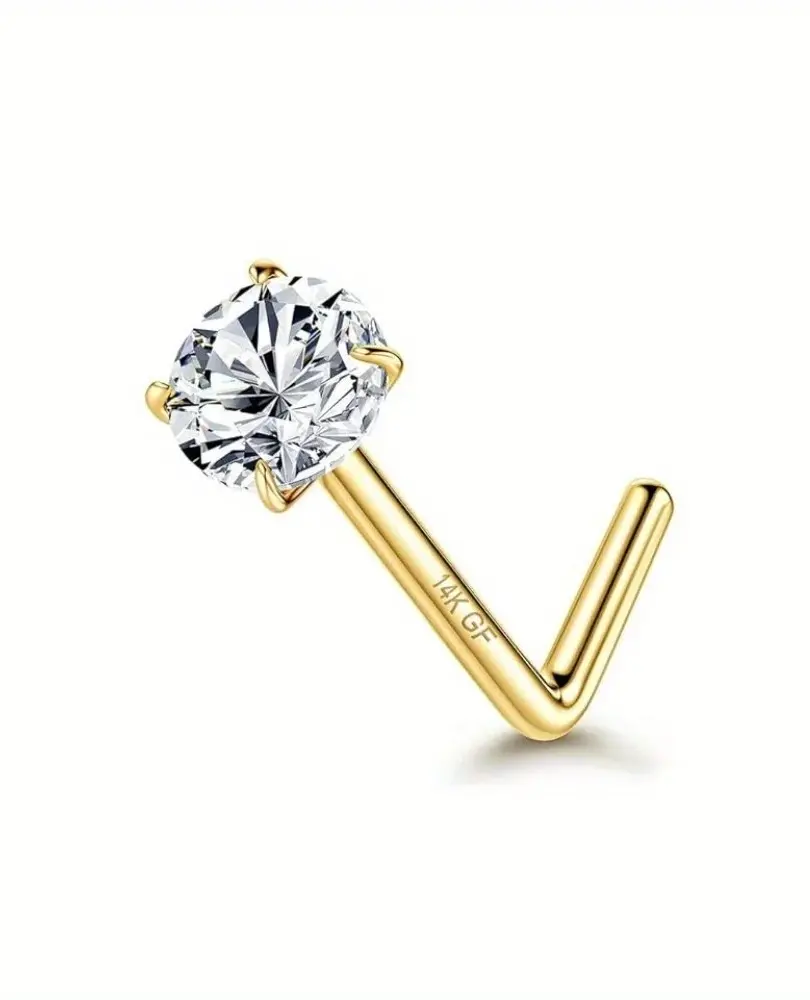 Close-up photo of Cusuti polished stainless steel nose ring with a classic geometric design .