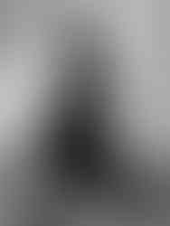 Black wide-leg pants with a high waist, cutout details, and pockets. Made from a breathable jersey fabric with slight stretch