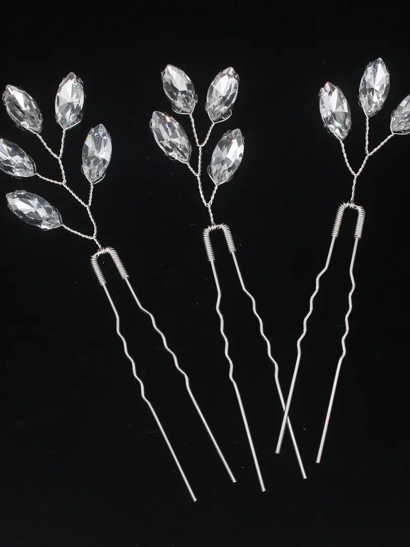 Pair of silver metal hair sticks with a round design Inspired by Cusuti's signature effortless style.