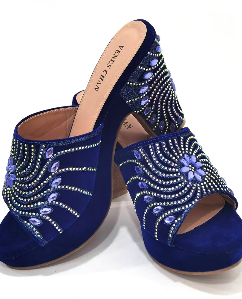 Gold platform slingback pumps with 9.5CM spike heels and slip-on closure.