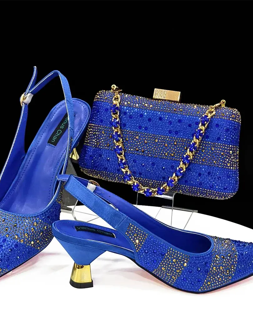 Pointed toe slingback pumps and metal-handled bag set with butterfly-knot detail.