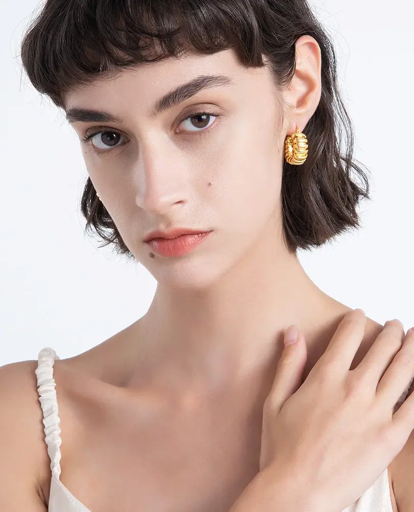 Classic Circle Hoop Earrings. Gold or silver finish (depending on availability). Crafted from eco-friendly brass Cusuti