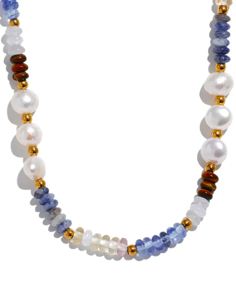 Stone pendant with a bold geometric design on a gold-plated stainless steel chain.