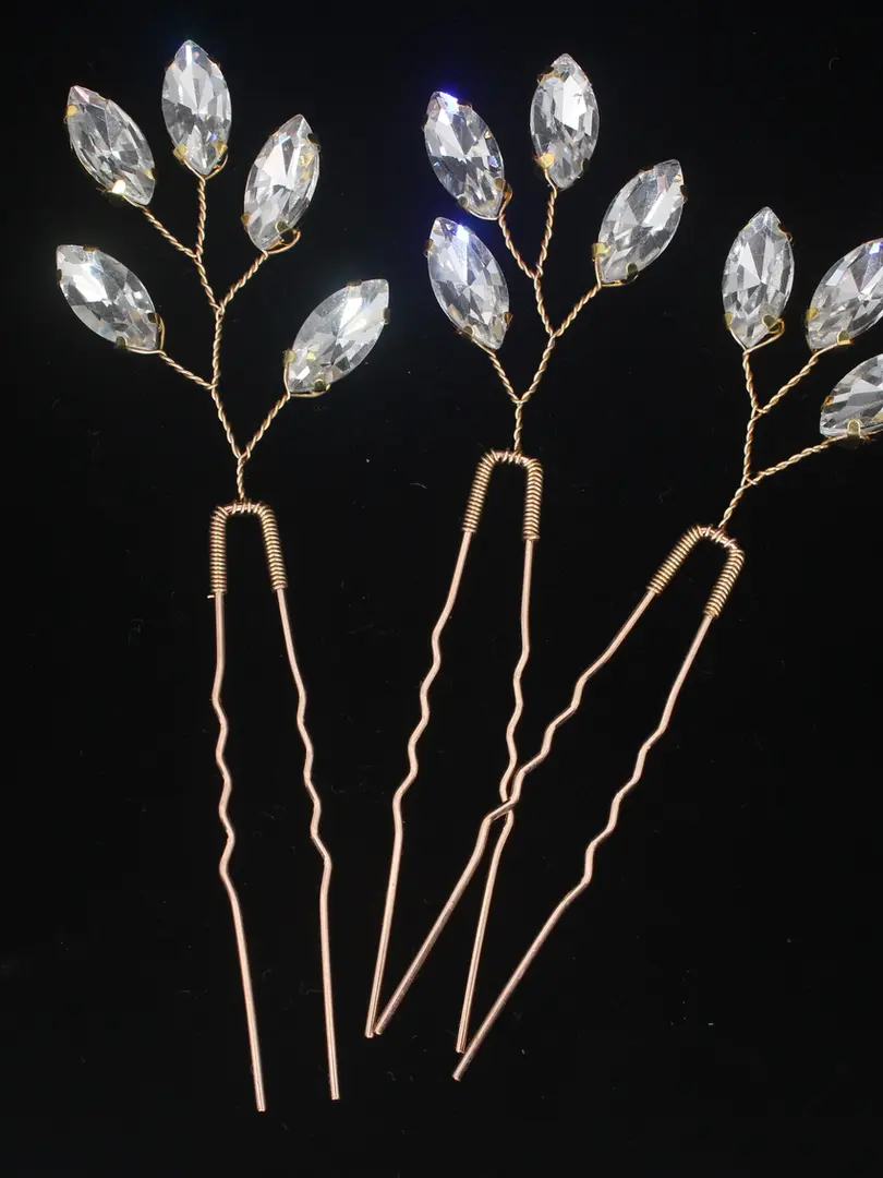 Pair of silver metal hair sticks with a round design Inspired by Cusuti's signature effortless style.