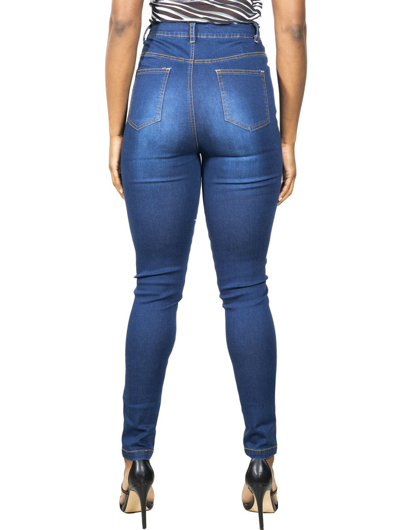 Pair of classic dark wash skinny jeans with a slightly faded finish.