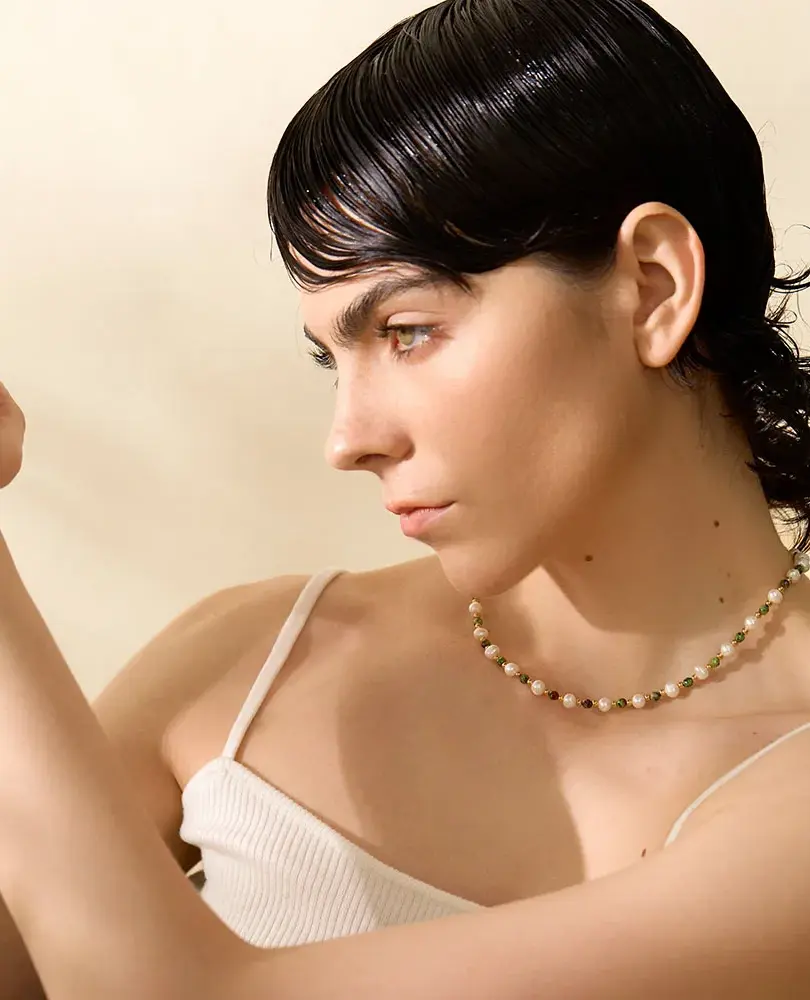 Freshwater pearl pendant with a trendy geometric design on a gold-plated stainless steel chain