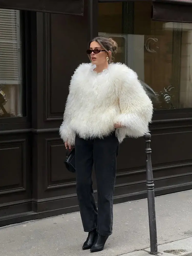 The Miley Cyrus Inspired Faux Fur Jacket, featuring a plush, oversized teddy faux fur design. Available at Cusuti.