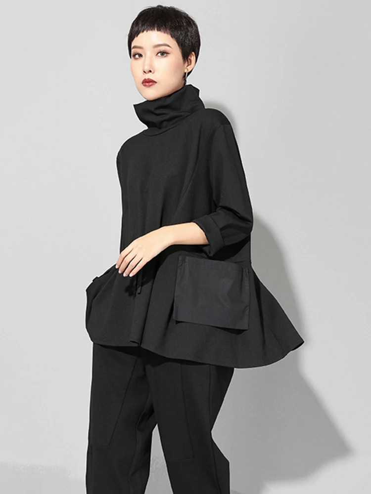 Black Turtleneck Long Sleeve Tee with relaxed fit and slight stretch. Cusuti. pen_spark