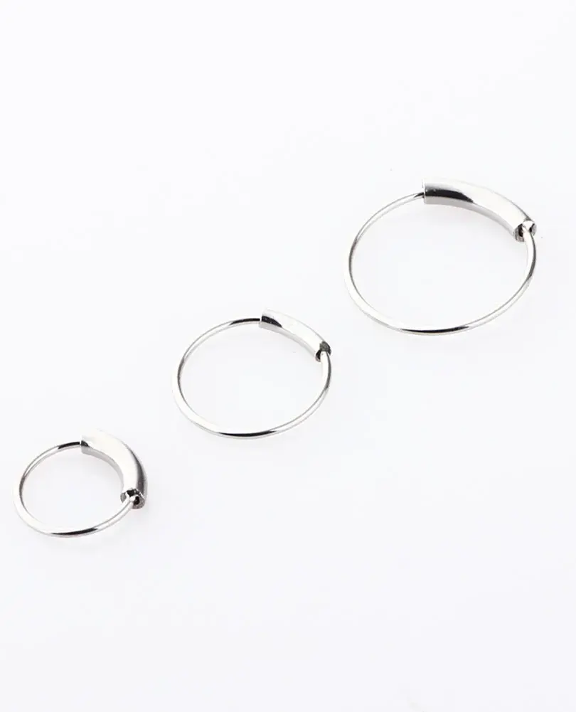Edgy round nose ring in polished stainless steel by Cusuti.
