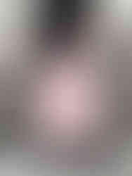 Mid-calf jersey dress with an empire waist, loose fit, and asymmetrical design