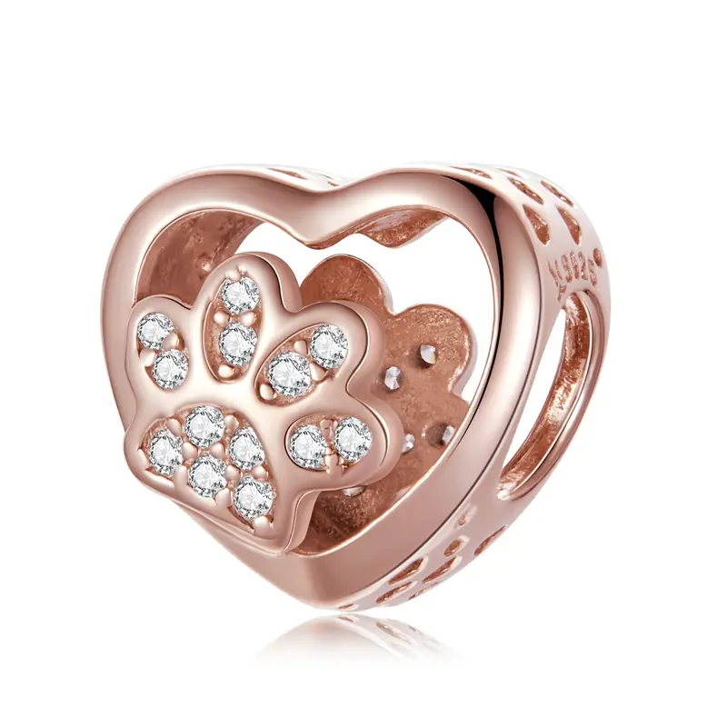 A bead crafted from 925 sterling silver in the shape of a heart, accented with a cubic zirconia.