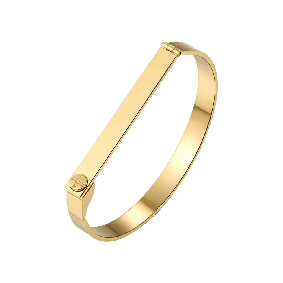 Engravable gold bangle bracelet. Personalized with name or message .