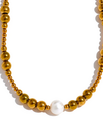 Features a trendy geometric design with a gleaming gold-plated finish, centered with a single, elegant freshwater pearl.