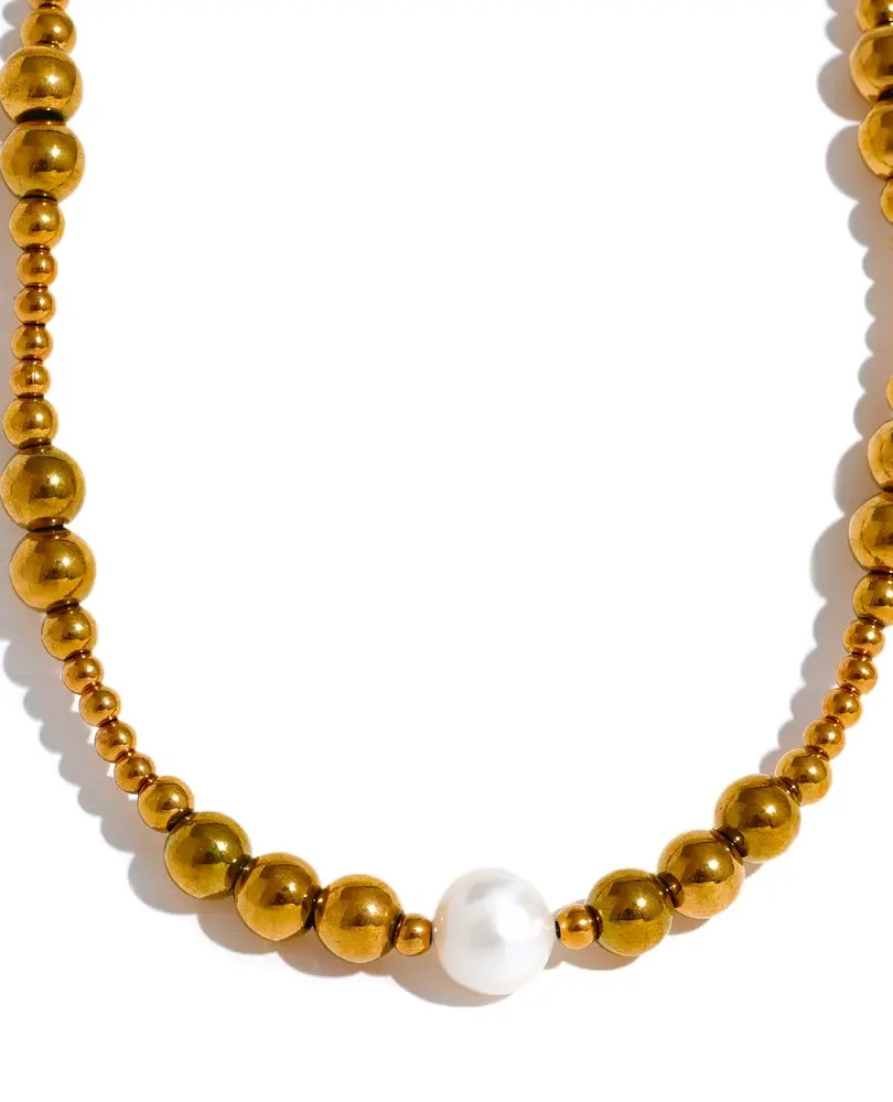 Features a trendy geometric design with a gleaming gold-plated finish, centered with a single, elegant freshwater pearl.