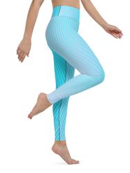 A woman confidently doing a yoga pose while wearing CoastFlex Sport Leggings in a stylish color