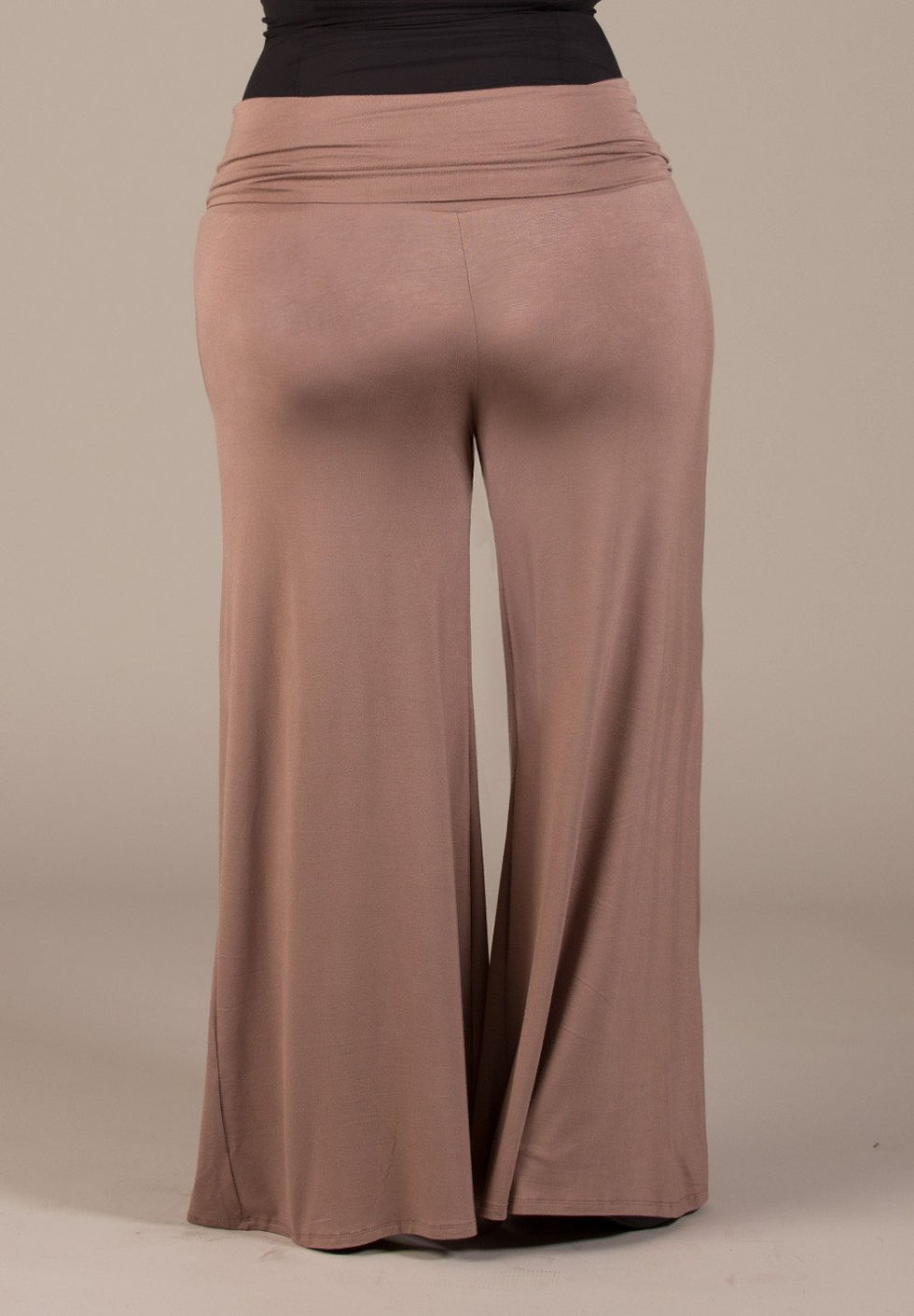 Mocha brown jersey knit bootcut pants, perfect for daytime outings, paired with a blouse and an open cardigan.