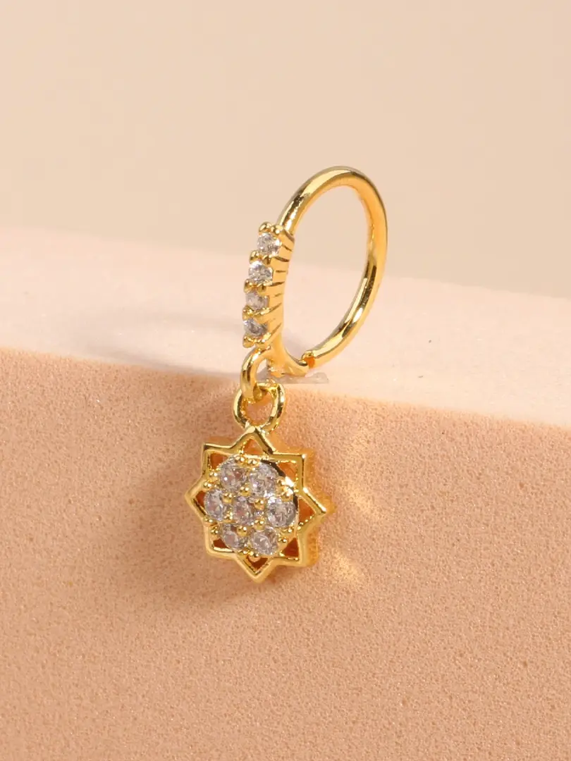 Classic geometric nose stud by Cusuti. Features a sparkling cubic zirconia on a copper base.