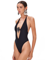 A detailed image of the Sabrina Carpenter black two-piece deep V-neck halter swimsuit from Cusuti, showcasing the halter neck