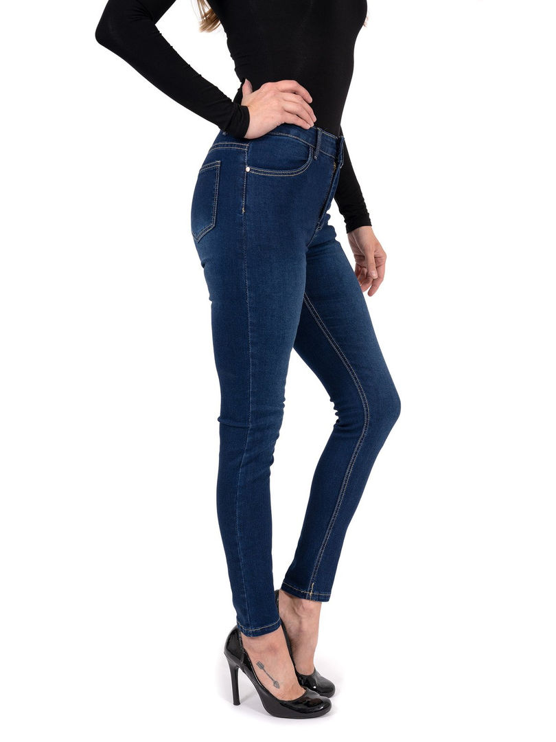 Pair of dark navy skinny jeans with slight fading details, showcasing the form-fitting silhouette.