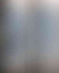 A woman wearing relaxed-fit, summer harem jeans made from a soft cotton-polyester blend. Cusuti jeans.