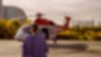 Medical Personell Facing away from camera towards Medical Helicopter