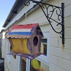 Megan's finished and painted hand-built bird house!