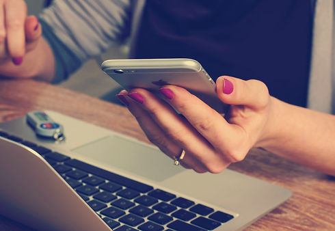 woman holding an iphone_edited_edited.jpg