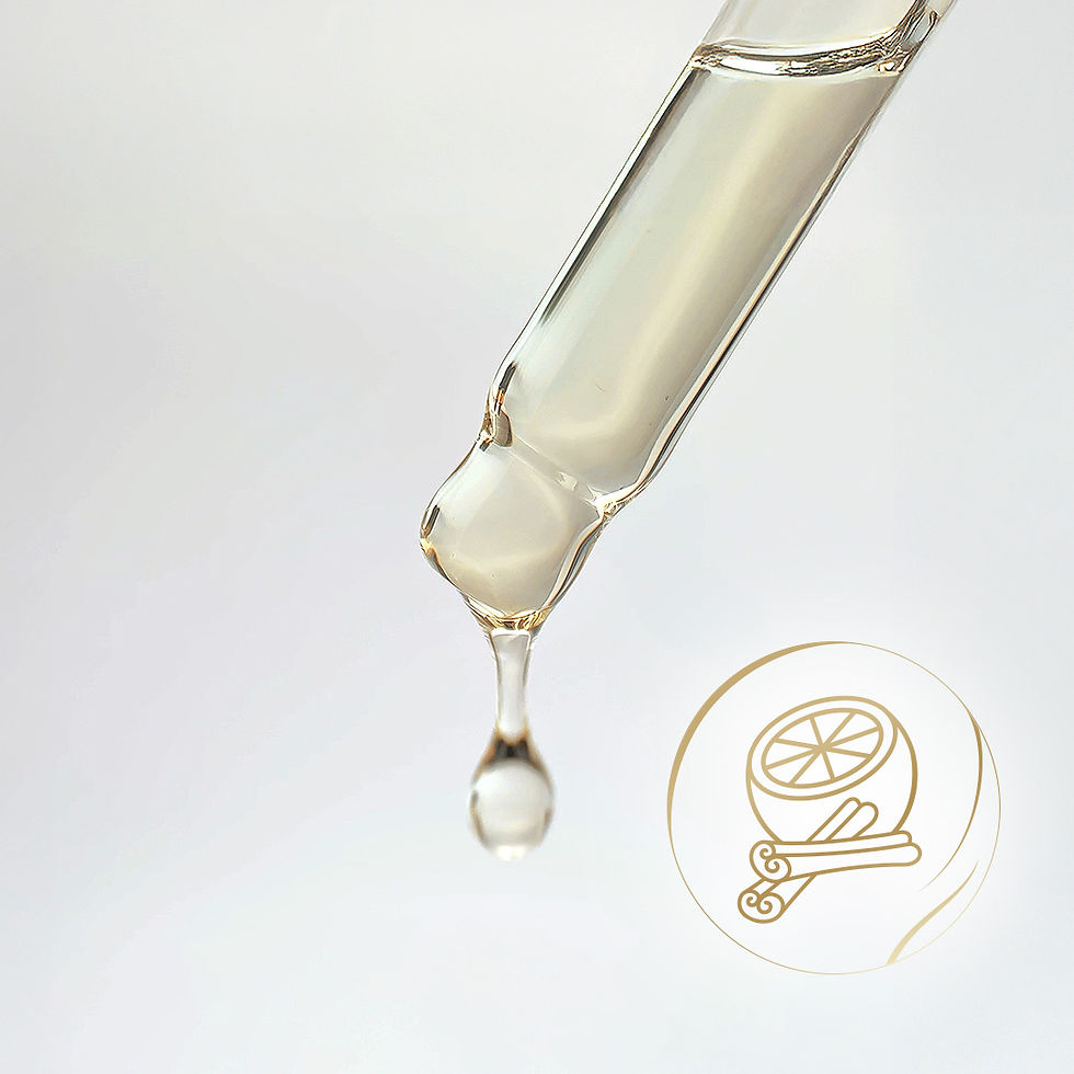 Goutte d’huile pour cuticules Orange-Cinnamon Fragrance tombant de la pipette.