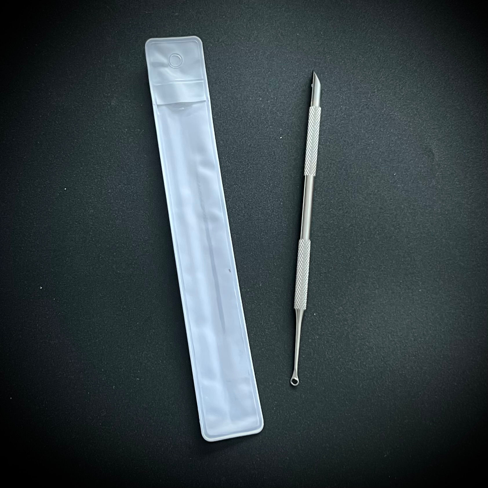 Edelstahl-Nagelhautschieber mit Doppelende und Grip