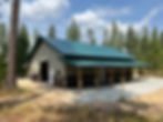 A post-frame pole barn with a lean-to, durable construction and an open design Ideal for f