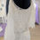 Thumbnail: Jasmine Bridal all lace wedding gown size 18 in ivory featuring a thin crystal bridal belt and flutter sleeves.