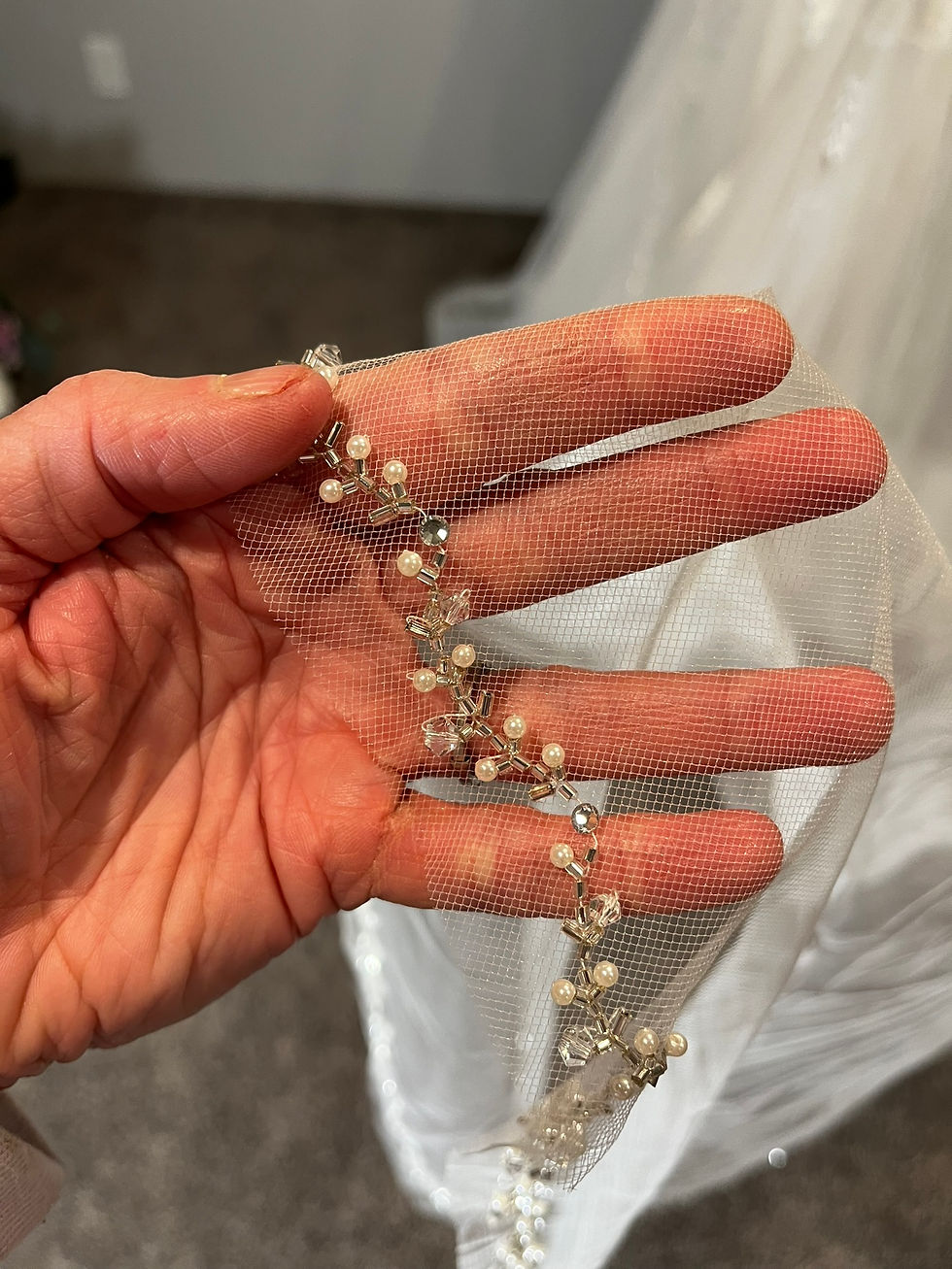 white chapel length veil with beaded and sequin edge