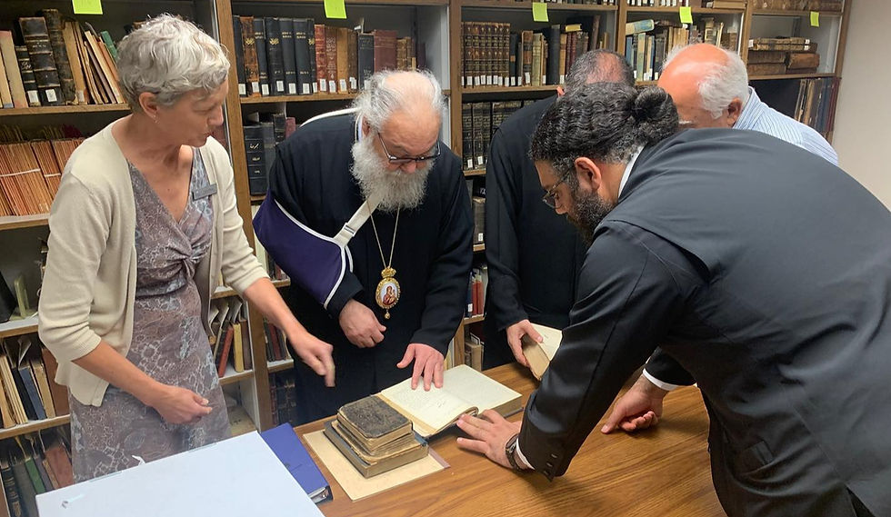 His Beatitude John X Patriarch of Antioch and all the East reviewing rare books in the Antiochian Heritage Library