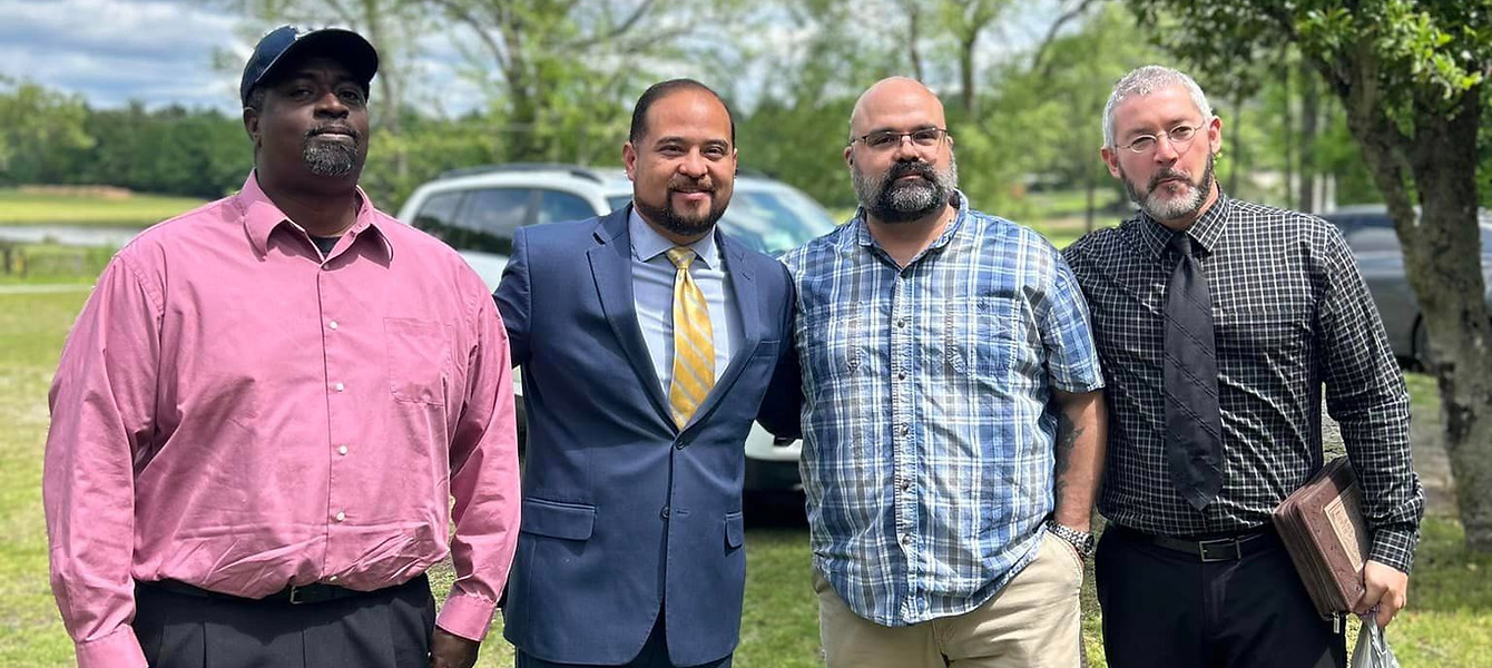 Men of Victory Baptist Church gather for a group photo