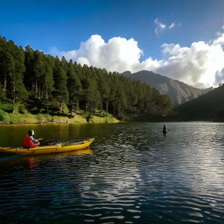 Kundala Lake surrounded by green hills and cloudy sky