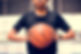 African American teenage boy holding a b