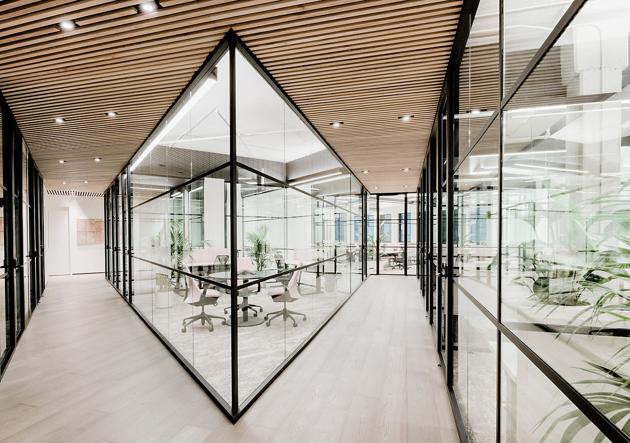 Modern office design with glass walls and boardroom