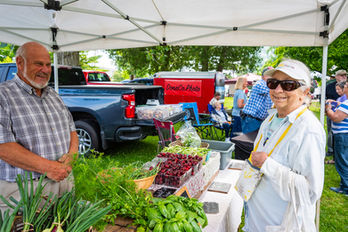 farmer and fresh produce at Jacksonport Farmers Market
