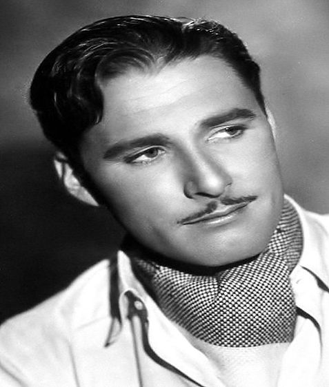 1938 photo below of Errol Flynn