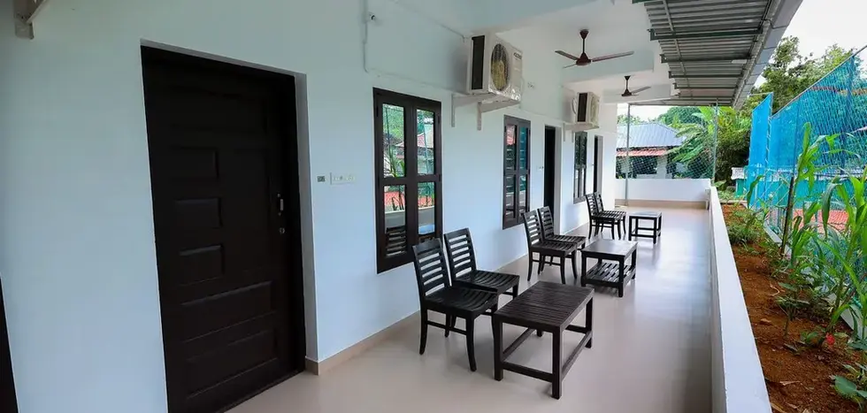 Porch of the Standard rooms- One side. At Illikkalam Lakeside Cottages, Kumarakom