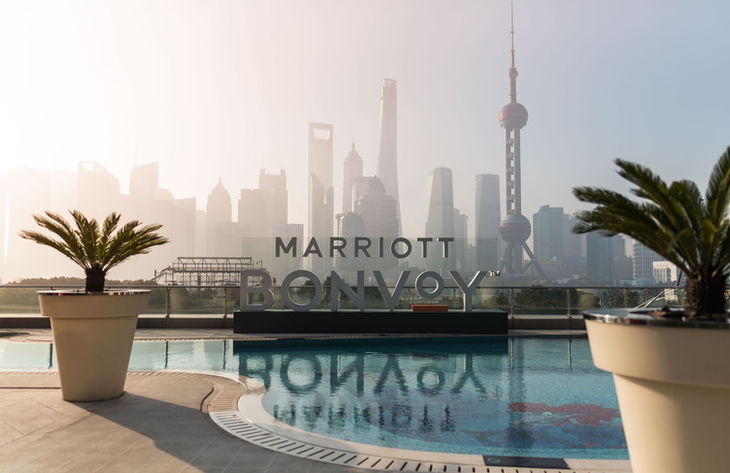 Marriott Conference in Shanghai. Logo near the swimming pool, Skyline in the back