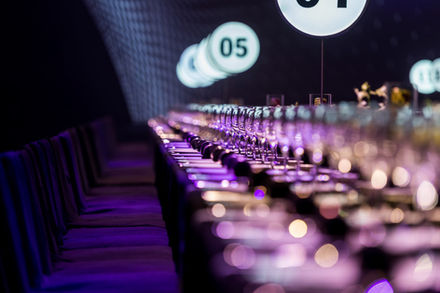 Atmospheric shot of a very long dinner table set up at a Porsche launch event in Shanghai