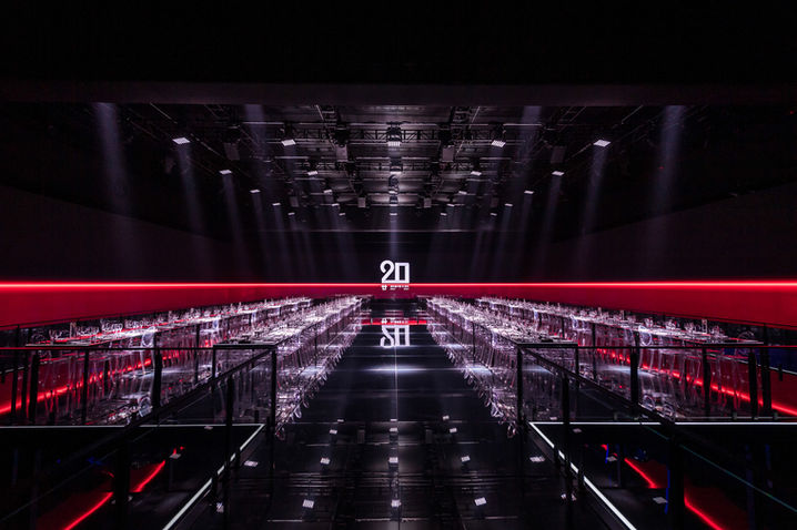 Empty venue foto of a dramatic dinner table set up at a high-end event in Shanghai from Porsche