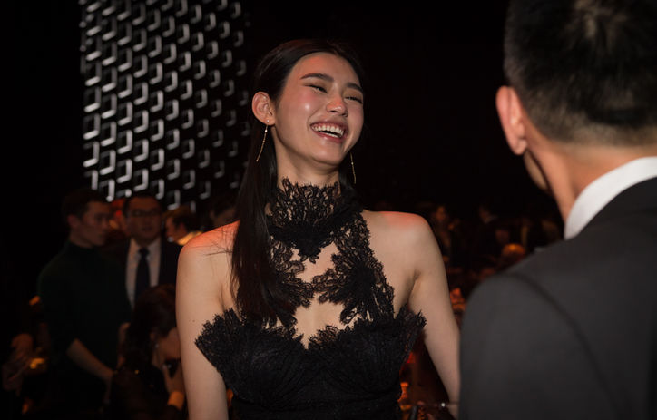 Smiling guests at luxury brand event in Shanghai — event photography by Pixel Bureau