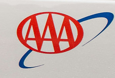 A white AAA tow truck._edited.jpg