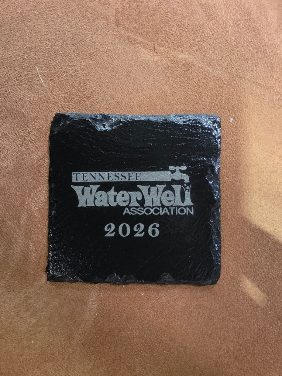 Square slate coaster laser engraved with a Tennessee Water Well Association logo